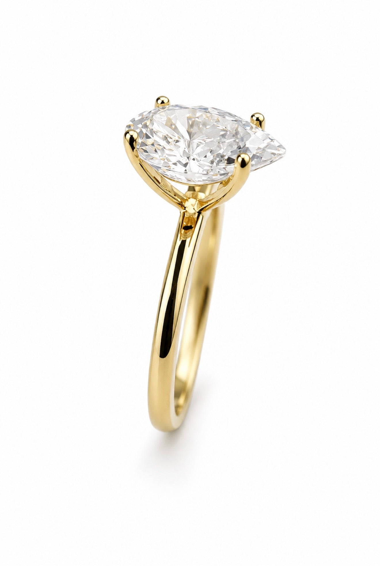 SOTTOZERO PEAR RING – 2CTW DVVS1/CB MOISSANITE, 925 SILVER & 14K WHITE VERMEIL