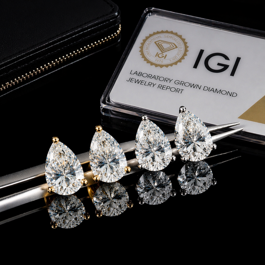 Gelati's "Diamond Tears" Pear Cut Cut VVS1 D-Color IGI Certified 1 CTW Diamond Earrings in solid 10k Gold