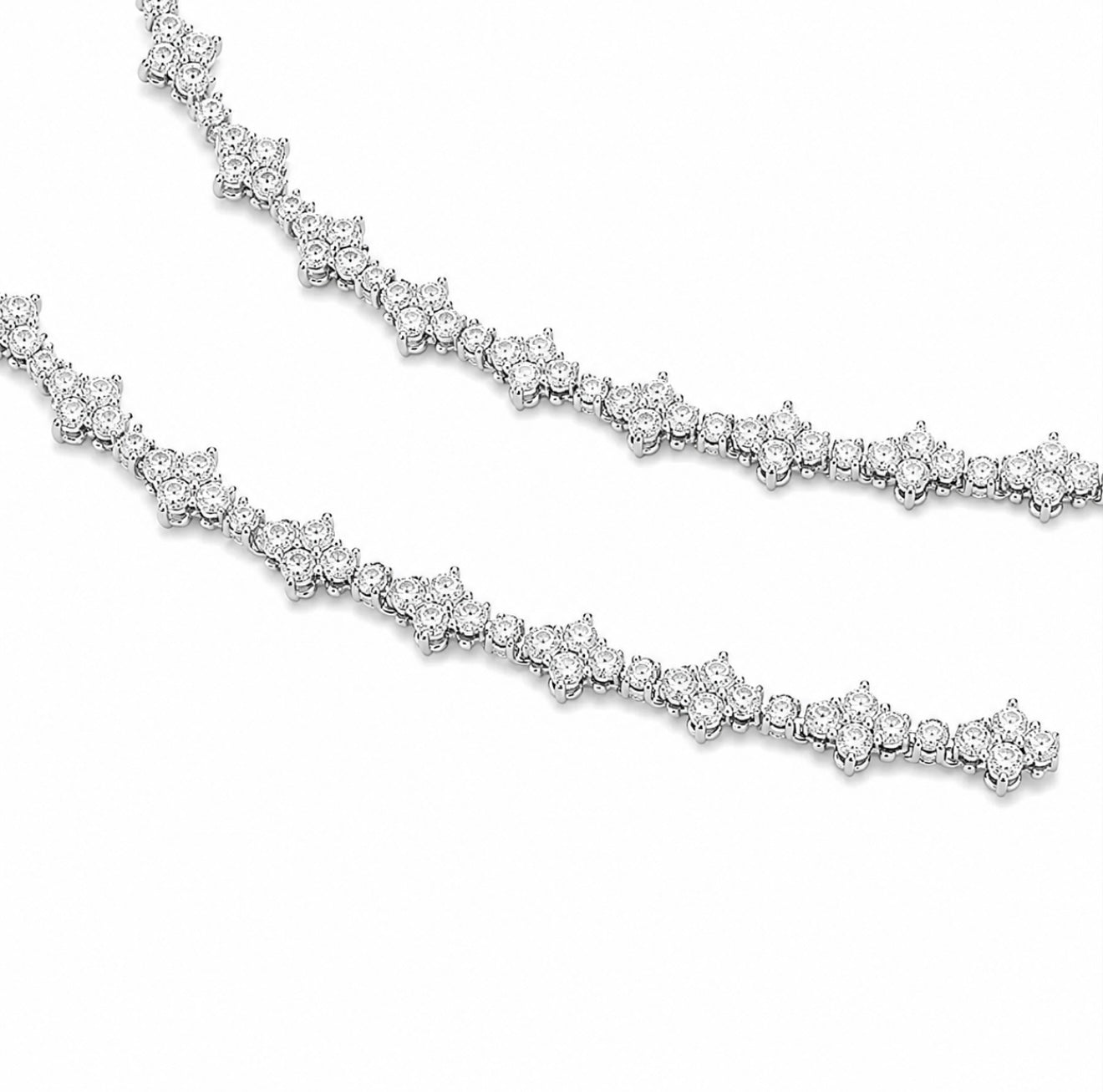 GELATI’S BESPOKE CROSS LINK DIAMOND TENNIS BRACELET WITH 18K VERMEIL GOLD
