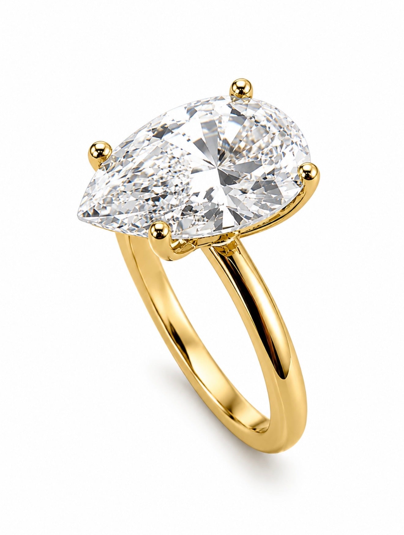 SOTTOZERO PEAR RING – 2CTW DVVS1/CB MOISSANITE, 925 SILVER & 14K WHITE VERMEIL