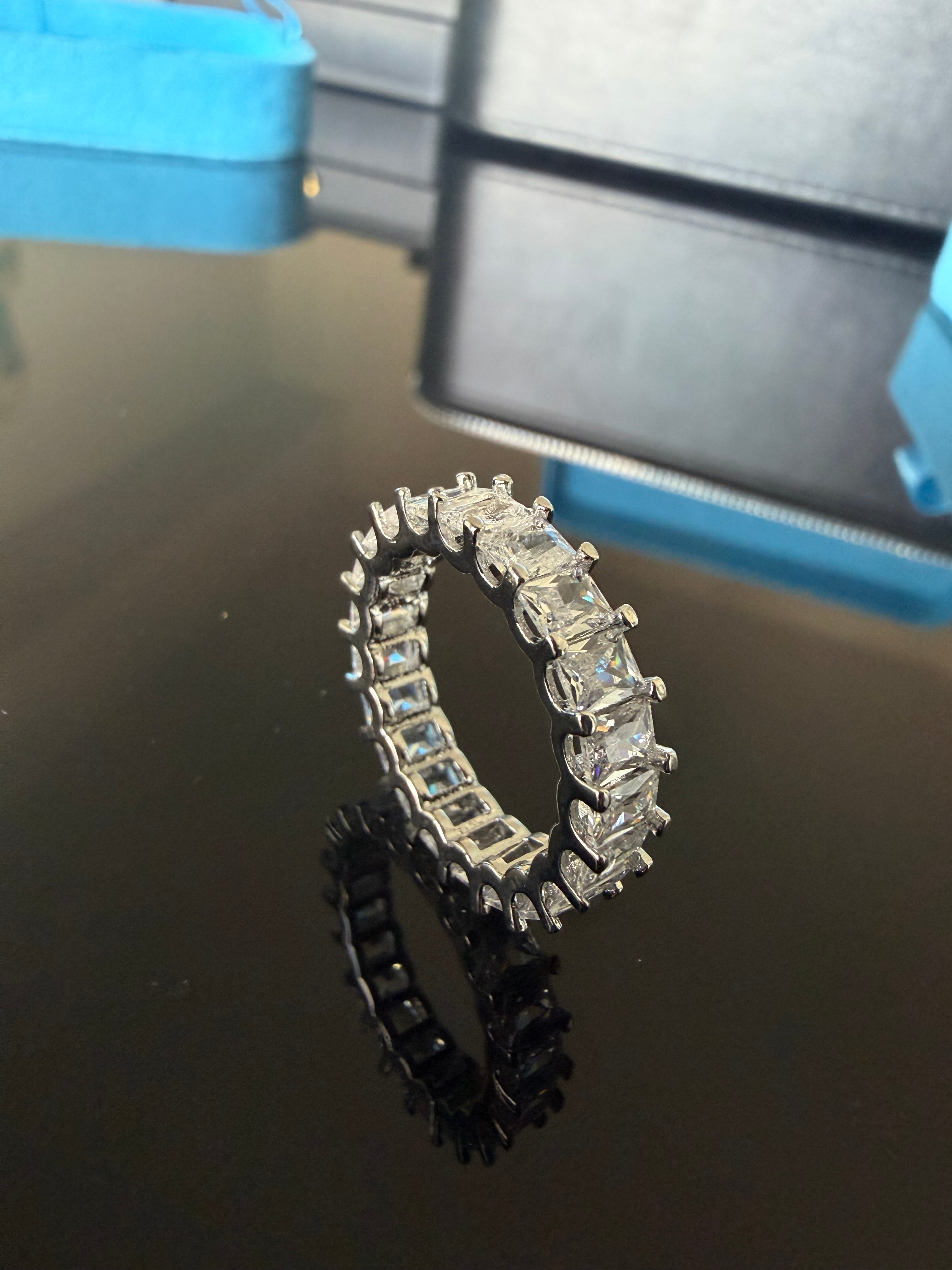Gelati's Baguette Emerald Cut DVVS1/CB Lab Moissante 3MM Eternity Ring in 925 Sterling Silver & 14k White Vermeil Gold Inlay
